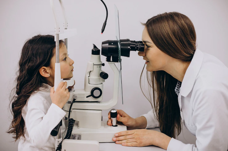 little-girl-checking-up-her-sight